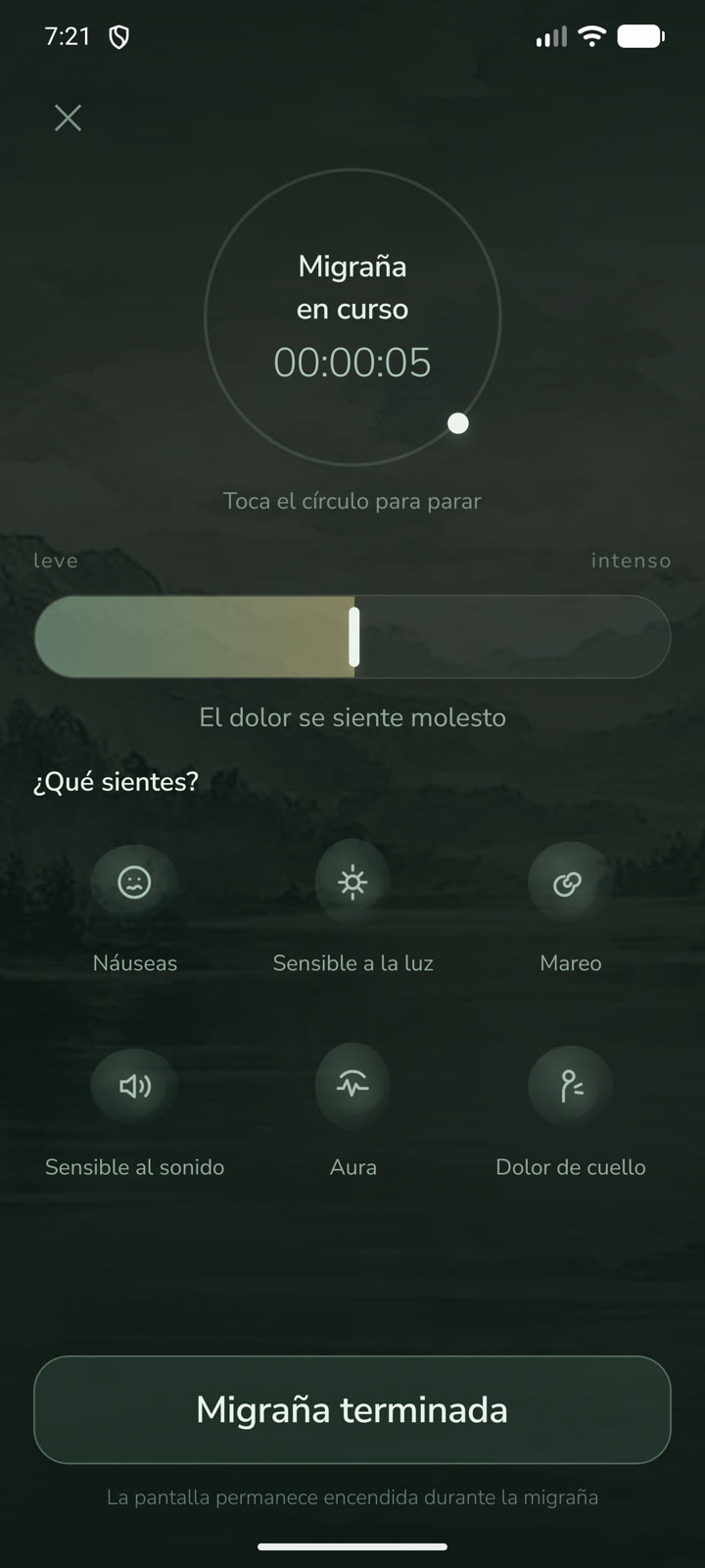 Pantalla de ataque activo: una pantalla extra oscura con un reloj en marcha y un gran círculo para tocar.